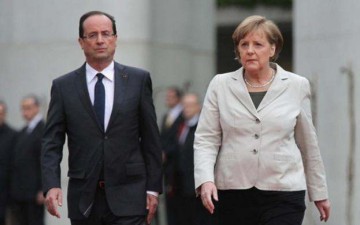 Bloomberg: Mέρκελ και Ολάντ ζητούν σύνοδο κορυφής μετά το «Όχι»
